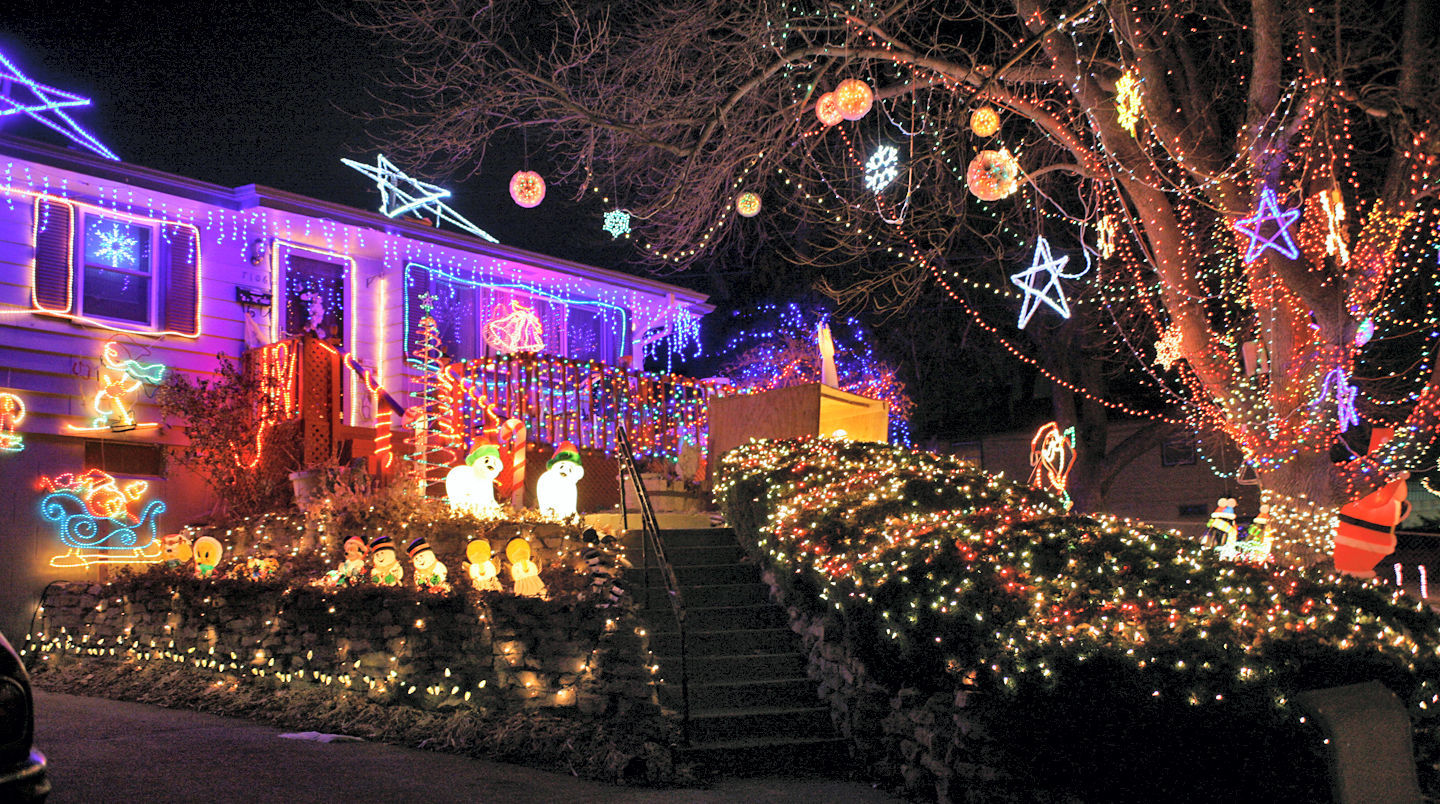 A house and yard are filled with Christmas lights on Wood River Drive, near 51st and Harrison streets.